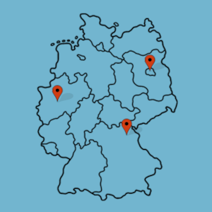 Digital Learning Map Karte von Deutschland mit den eingezeichneten Bundesländern. Drei rote Pinnnadeln markieren verschiedene Orte (Hochschulen) in Deutschland.